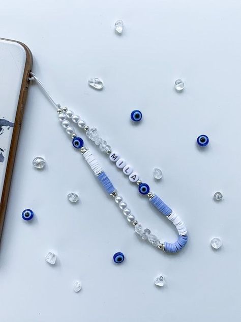 Beaded Phone Charms Blue, How To Make Phone Accessories Beads, Blue Phone Strap Beads, Bracelet Color Ideas Beads, Blue Phone Charm Ideas, Phone Charm Beads Ideas, Beads Shop Name Ideas, Crystal Phone Strap, Beaded Gifts Diy