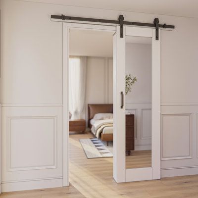 This sliding glass barn door combines practicality and aesthetics, featuring not only a simple installation, durability, but also an exquisite design. Its sliding mechanism significantly saves the space required for opening the door, allowing it to elegantly integrate into spaces of various sizes. To further simplify the installation process, we have carefully designed pre-drilled holes for easy alignment, and provided a clear instruction manual, ensuring that even DIY enthusiasts can easily com Master Suite Layout, Sliding Glass Barn Door, Mirror Barn Door, Bedroom Barn Door, Sliding Mirror Door, Glass Barn Door, Sliding Mechanism, Bypass Barn Door, Mirror Closet Doors