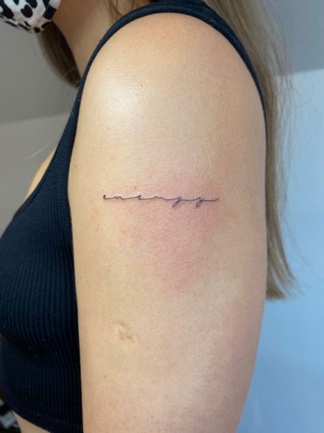 Cursive Minimalist Tattoo, Dainty Tattoo Writing, Elongated Script Tattoo, Fine Line Writing Tattoo Arm, Spaced Out Cursive Font Tattoo, Simple Cursive Tattoo, Upper Arm Word Tattoo, Fine Writing Tattoo, Long Cursive Font Tattoo