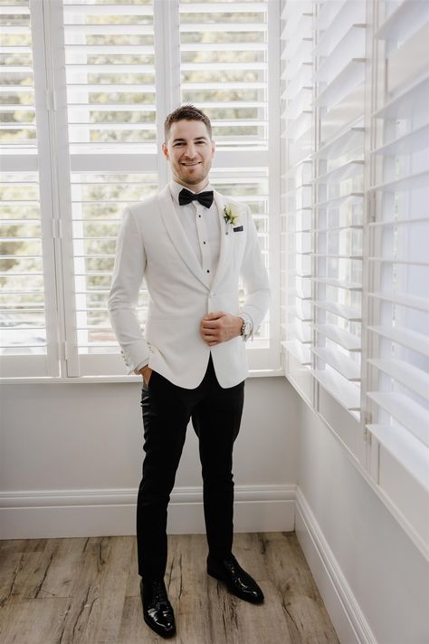 Love the White suit jacket and classic black bow tie - so elegant! Photography 📸 Bright Light Weddings Bramleigh Estate, White Suit Jacket, Elegant Photography, Groom Wedding Attire, White Suit, Black Bow Tie, Luxury Wedding Venues, Wedding Lights, Bright Light