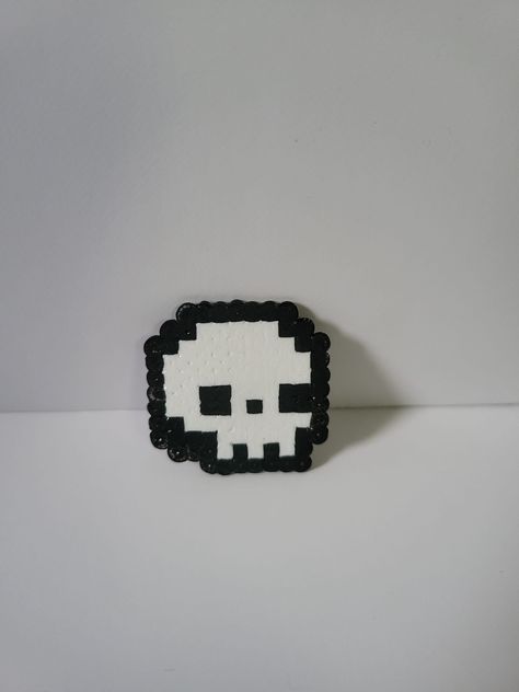 Here we have some cute mini badges in multiple variations - Ghostie - Black Cat - Bat - Skull - Happy Ghostie These are made from Mini Hama Beads and have either hinged pin badge backing, or a pin badge backing for attachment.  As they are handmade, they all have slight variations which makes them all unique! Perler Bead Patterns Halloween Small, Melty Bead Patterns Halloween, Iron Beads Halloween, Hama Beads Halloween Pattern, Halloween Perler Patterns, Button Pins Ideas, Small Hama Bead Designs, Hama Bead Ideas, Halloween Hama Beads