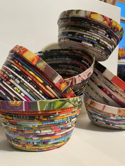 Stylishly durable and instantly eye-catching, my recycled magazine bowls show off your unique style while serving a purpose at the same time. Made from recycled magazine pages, my beautifully colored and sturdy bowls add a unique touch to any room. Ideal as storage bowls for your keys, change, office supplies, etc. They can also just simply be a decorative piece that will make your home feel more colorful. As each bowl is made from many individual magazine pages, each is one of a kind. Magazine Bowl, Recycled Magazine Crafts, Diy Stressball, Recycled Paper Crafts, Recycled Magazine, Denim Crafts Diy, Blue Jeans Crafts, Food Appetizers, Magazine Crafts