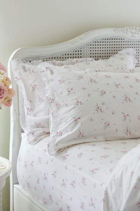 Add an elegant touch to your bedscape with the Rosabelle Petite Ruffle Pillowcases from Shabby Chic by Rachel Ashwell. Made from pure cotton with a 200 thread count, this set of 2 pillowcases are coated in a pretty floral design and finely finished with ruffle edges. Match with coordinating Rosabelle Bedset and fitted sheet for a complete set. Machine washable. Pillowcase 1 and Pillowcase 2 100% Cotton. Floral Bed Cover, Shabby Chic Duvet Covers, Floral Bedding Aesthetic, Fangirl Room, Shabby Chic Ideas, Laura Ashley Sofa, Shabby Chic Duvet, Dreamy Interiors, Modern Shabby Chic