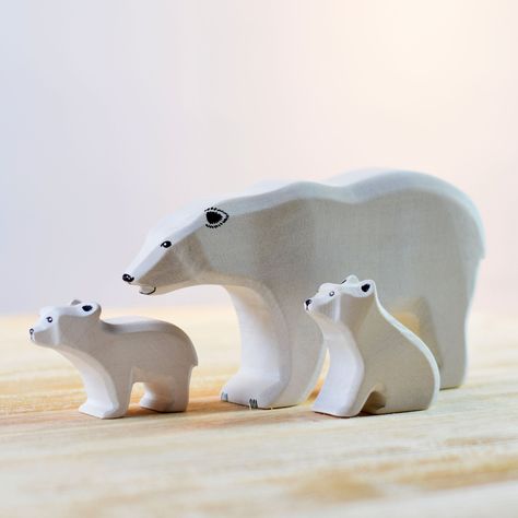 ⫸ D E S C R I P T I O N ⫷ Here is the king of the arctic - The polar bear. ⫸ D E T A I L S ⫷ This wooden bears toy would be a great addition to any Waldorf nature table or play space. MATERIALS UTILISED: Lime wood, non-toxic paints EN 71 standard AGE: 3+ years DIMENSION (h x w x t) Polar Bear: 9,5cm x 18cm x 3,5cm Polar Bear Cub: 4.5cm x 7,5cm x 2.5cm Polar Bear Cub Sitting: 5,2cm x 6cm x 2,5cm Ice Floe: 0,8cm x 17cm x 10cm ⫸ P E R F E C T F O R ⫷ 🎁 Third Birthday Gift 🎄 Christmas or New Year Wooden Polar Bear, Wood Polar Bear, Wooden Bears, Waldorf Nature Table, Wood Jewelery, Polar Animals, Wooden Bear, Handmade Wooden Toys, Bear Cub