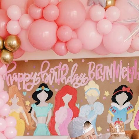 Jessica Crum on Instagram: "in our princess era 👑💖 what a special day celebrating our sweet girls. brynnleigh just turned FOUR & brooklyn turns ONE next week! (how is that possible? I swear I just had her 😭). so we celebrated like royalty with friends, family, and even our favorite princesses! those excited squeals will forever be embedded in my brain. never grow up, my girls.   shout out to my amazing vendors who helped pull this together 🫶🏼 balloons: @ohsnapletsparty  paint banner: @afterninedesigns  tables & chairs: @houstontentsevents  cake & cupcakes: @buttercuphouston  princesses: @fairestofallparties  dresses: @tutudumonde 📸: @therosemaryhen" Cheap Princess Party Ideas, Princess Theme 2nd Birthday Party Ideas, Four Year Old Princess Party, Princess Party Themes, Forever A Princess, Second Birthday Princess Theme, Princess Party Three Year Old, Four Party Theme, Disney Princess Third Birthday Party