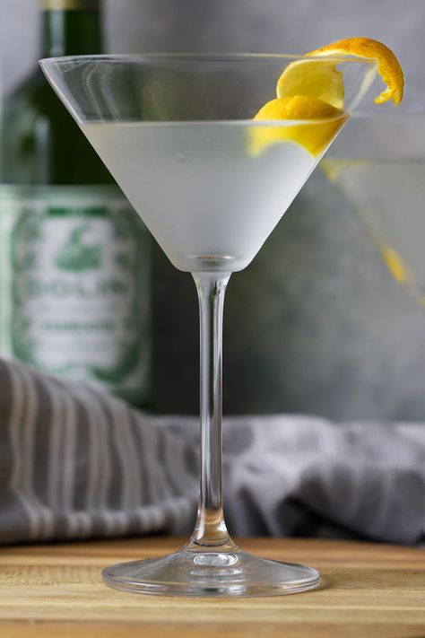 This vodka martini is a popular twist on the classic martini. Combine vodka with dry vermouth for an instant and deliciously easy cocktail. Martini With A Twist, Vodka Wine, Classic Martini, Easy Cocktail, Vodka Martini, Dry Vermouth, Easy Cocktails, Vermouth, Mixology