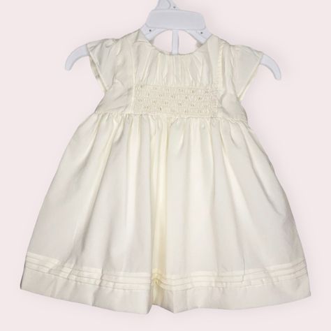 Nwt Edgehill Collection Dress Ivory Smocked Charmeuse Size 3 Months New With Tags, Never Been Worn, Smoke Free Home Milk White Short Sleeve Dress With Bloomers, Smocked Front, Flutter Sleeve, Pleated Details, Button Back, Silky Polyester Blend Fabric, Baby Girl Dress, Special Occasion, Holiday, Easter Dress. Smocked Christmas Dresses, Girls Navy Dress, White Short Sleeve Dress, Toddler Christmas Dress, Smocked Baby Dresses, Short Sleeve Floral Dress, Peter Pan Collar Dress, Elastic Waist Dress, Red Velvet Dress