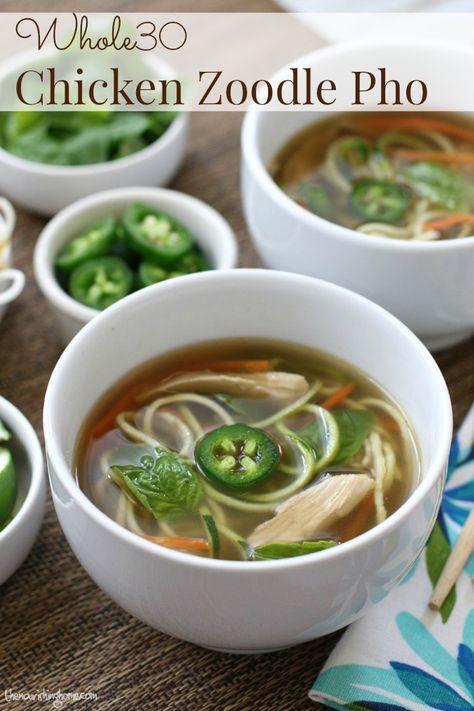 This Whole30-friendly Chicken Zoodle Pho Bowl uses homemade broth and roast chicken to reduce the cook time, while still giving this soup a rich depth of flavor. Chicken Zoodle, Veggie Noodle, Chicken Pho, Pho Soup, Whole30 Chicken, Pho Bowl, Chicken Tonight, Paleo Soup, Lectin Free