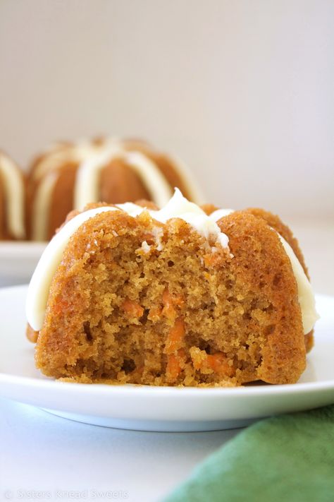 This is the best carrot cake recipe we have ever had and makes the most delicious, flavorful, and moist cake!﻿ These mini bundt cakes are adorable and make the perfect treat for Easter! Mini Bundt Cakes Carrot Cake, Mini Carrot Cake Recipe, Dash Mini Bundt Cake Maker Recipes, Easter Mini Bundt Cakes, Dash Mini Bundt Maker Recipes, Mini Bundt Cakes From Cake Mix Boxes, Mini Bundt Cake Recipes, Carrot Cake Bundt, Mini Bunt Cake