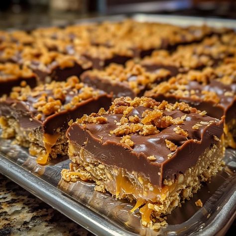 - chefsdiscover Better Than Anything Bars Recipe, Butterfinger Reese’s Fudge, Desserts With Caramel Bits, Butterfinger Crunch Bars, Butterfinger Bits Recipes, Butterfinger Caramel Bars, Butterfinger Salad, Butterfinger Caramel Crunch Bars, Caramel Bits Recipes