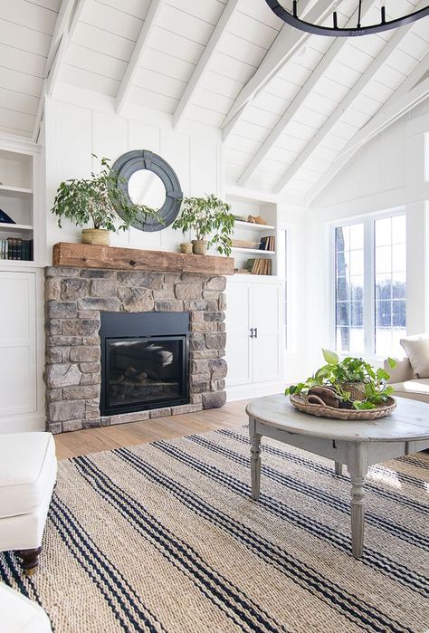 Stone fireplace Plants Fireplace, Coastal Fireplace Ideas, Salons Cottage, Coastal Fireplace, Decorating With Plants, Cottage Fireplace, Farmhouse Fireplace, Freestanding Fireplace, Coastal Living Rooms