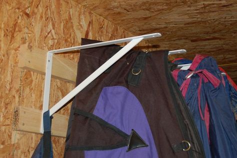 Barn on a Budget: 5 cheap and easy stable fixes  | HORSE NATION Horse Blankets Storage, Horse Blanket Rack, Barn Organization, Equine Stables, Horse Tack Rooms, Horse Farm Ideas, Barn Hacks, Diy Horse Barn, Horse Barn Ideas Stables