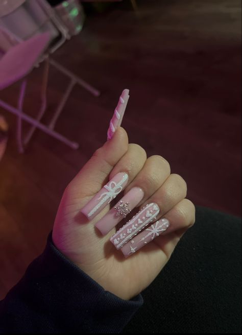 Long Acrylic Nail Designs Pink And White, Christmas Nail Sets Pink, Winter Nail Sets Acrylic, Pink Christmas Nails Coffin, White Acrylic Christmas Nails, Pink Winter Nail Set, Long Square Acrylic Nails Christmas, Winter Nails With Charms, Pink White Christmas Nails