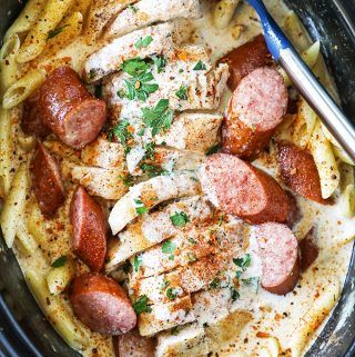 Slow Cooker Cajun Chicken Alfredo - No. 2 Pencil Slow Cooker Cajun Chicken Alfredo, Cajun Chicken Alfredo Recipe, Potatoes And Smoked Sausage, Slow Cooker Cajun, Cajun Alfredo, Sausage Alfredo, Cabbage Potatoes, Chicken Alfredo Recipe, Cajun Chicken Alfredo