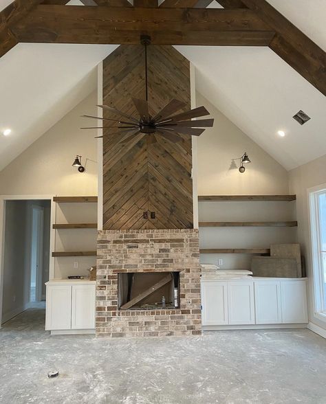 Vault Ceiling Living Room Fireplace, Faux Fireplace Tall Ceilings, Tall Rock Fireplace Wall High Ceilings, Built In Bookshelves Around Fireplace Vaulted Ceiling, Cathedral Fireplace Ideas, Wall To Wall Fireplace, Tall Brick Fireplace High Ceilings, Brick Fireplace Vaulted Ceiling, Vaulted Living Room With Fireplace