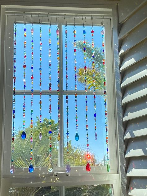 This Suncatchers item by SeaDriftShoppe has 1235 favorites from Etsy shoppers. Ships from Carlsbad, CA. Listed on Jun 16, 2024 Crystal Suncatchers Diy, Glass Bead Crafts, Suncatcher Diy, Bohol, Beaded Curtains, Apartment Decor Inspiration, Crystal Suncatchers, Curtains With Rings, Wire Crafts