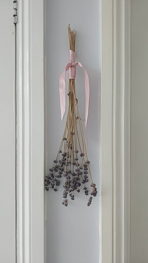 Lavender being hung with a pink bow inside house Hanging Lavender Decor, Inside House Aesthetic, Dried Lavender Decor, Lavendar Walls, Blackstone Kitchen, Hanging Lavender, Aesthetic Lavender, Concrete Room, Lavender Decor