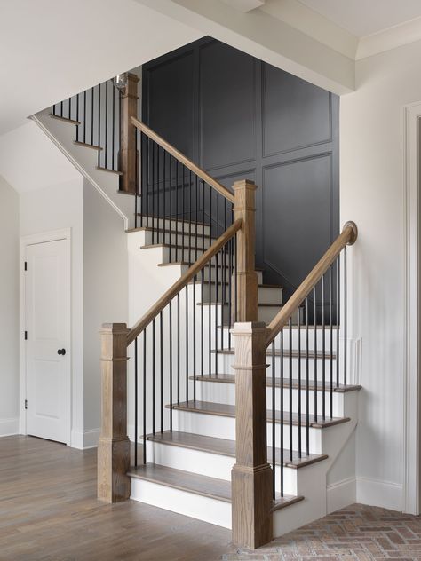 The Grove at Forest Hills - Lot 1 - Devin Taylor Interior Design Banister Overlooking Living Room, Entry Modern Farmhouse, Entry Ways With Stairs, Modern Farmhouse Banister Railings, Farmhouse Stair Wall Decor, Entry Way With Staircase, Farmhouse Entry Stairs, Modern Entry Way Decor Ideas, Stair Railing Ideas Modern Farmhouse