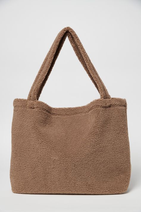 Why we love it? A super cool handmade bag from supersoft teddy material, that looks just as cool slung over your shoulder as it does over your buggy handles. Big enough to fit all your essentials in it, and roomy enough to use for a day trip or night away. It might be in this season's cool beige colour, but it can be machine washed Size: 58cm X 42cm;Material: 100% polyester Mom Bag, Breastmilk Storage Bags, Stroller Bag, Mom Bags, Multipurpose Bag, Soft Teddy, Trendy Mom, Practical Bag, Handmade Tote