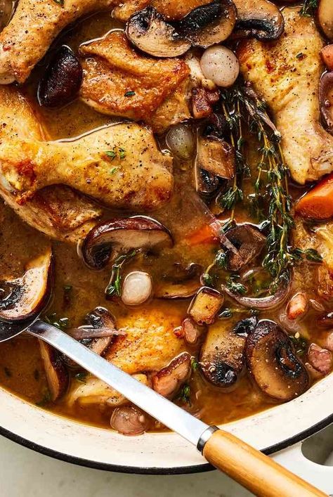 This deeply savory coq au vin recipe from Ina Garten is made with whole chicken cut into pieces, mushrooms, pearl onions, Cognac, and Burgundy. Coq Au Vin Recipe Ina Garten, Ina Roasted Chicken, Co Au Vin Chicken, Cou Au Vin Chicken, Coc Au Vin Chicken, Cocovan Coq Au Vin, Cog Au Vin Recipe, Chicken Gourmet Recipes, Whole Chicken Cut Up Recipes