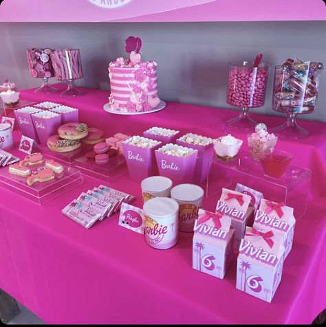 Come on barbie, let's go party  | CatchMyParty.com Barbie Party Cake Table, Barbie Birthday Dessert Table, Barbie Foods For Party, Barbie Cake Table Ideas, Barbie Party Table Set Up, Barbie Themed Birthday Party Decor Table Settings, Kids Barbie Party, Barbie Marathon, Barbie Food Ideas For Party