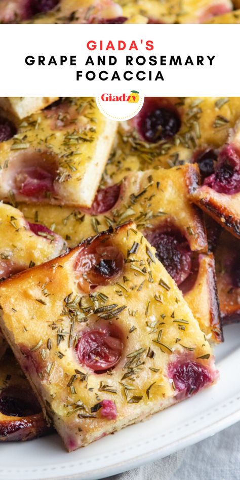 In Bobby and Giada In Italy, we made this grape and rosemary focaccia. It resulted in such a beautifully crisp and crunchy bread, and the fresh grapes and rosemary gave it beautiful flavor. I love the way the grapes burst in the oven, which seeps into the dough and gives it even more flavor. Now, we don’t all have access to beautiful grapes growing outside our door like we did in Tuscany (if only!), but I find that it’s still great with most store varieties. Giada De Laurentiis Foccacia, Giadzy Recipes, Italian Sides, Focaccia Recipes, Foccacia Bread, Giada Recipes, Rosemary Focaccia, Focaccia Recipe, Bread Makers