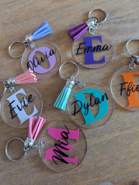 Name/initial Key chains Perfect gift for any occasion or even a class present!  Chose between pink, coral, purple, lavender, blue, green or orange tassels.  These key chains can be personalized with any name. Also available with personalized cards, if so please select with card option and add what you would like on the card under the name you would like on the keychain in the personalisation section. Multibuy options available - these options automatically come with personalized cards, please ad Resin Tags, Cricut Keychains, Acrylic Key Chains, Name Keychains, Resin Letters, Name Keychain, Monogram Keychain, Acrylic Keychains, Keychain Personalized