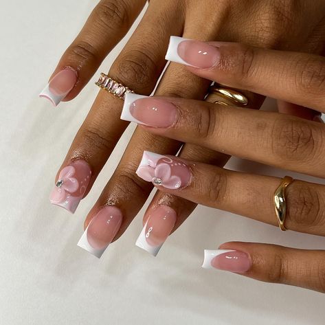 🌸 • • • • #nailsxkay #nailsnailsnails #apresnails #gelx #gelxnails #prettynails #trendynails #naildesign #nailart #nailextentions #bombnails #cutenails #baddienails #nailinspo #pinterestnails #trendynails #explore #explorepage #scvnails #calinails #LAnails #summernails #nailsofinstagram #LAnailtech #flowernails #frenchtipnails #3dflowernails Square White Nails Design, French Tips Styles, Almond Pink Flower Nails, Barbados Nail Design, Nails One Finger Design, White Tip Acrylic Nails With Design, French Tip Acrylic Nails With Flower, Pink French Tip With Flowers, Short Acrylic Nails With Initials