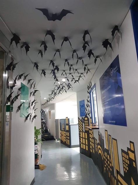 Batman Batcave Ideas, Superhero Office Decor, Batman Door Decorations, Batman Room Decor Man Cave, Tim Burton Classroom Theme, Diy Batman Decor, Gotham City Themed Party, Batman Display Ideas, Villian Decorations