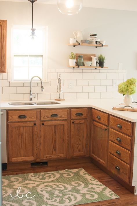 Refinished Oak Kitchen Cabinets, White Walls Wood Cabinets Kitchen, 90s Wood Kitchen Cabinets, Wood Cabinet Hardware Kitchen, Tudor Brown Briwax On Oak Cabinets, Counter Tops For Oak Kitchen Cabinets, Briwax On Honey Oak Cabinets, Backsplash Oak Cabinets, Diy Fretwork