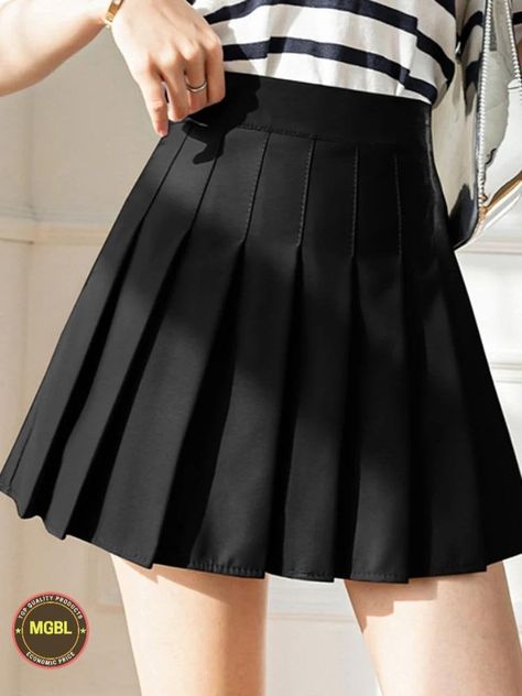 Introducing our Women's High Waist Pleated Skirt, a chic and versatile addition to your wardrobe that exudes preppy style and sophistication. This solid pleated mini skirt is designed to flatter your figure with its high waist silhouette and timeless design. Crafted with meticulous attention to detail, our pleated skirt boasts a classic preppy style that never goes out of fashion. The high waistline accentuates your curves while providing a comfortable and flattering fit that's perfect for any occasion. Whether you're dressing up for a day at the office or heading out for a weekend brunch with friends, our High Waist Pleated Skirt is sure to make a statement. Pair it with a blouse or sweater for a polished and put-together look, or style it with a graphic tee and sneakers for a more casual Preppy Mode, Streetwear Korean, Womens Pleated Skirt, Skirts Summer, Estilo Preppy, Pleated Skirts, Style Preppy, Empire Dress, Student Fashion