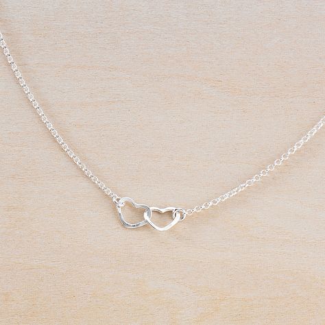 Online exclusive! These tiny linked hearts are the happy focus of this adorable necklace! Two sterling silver hearts are hammered and linked together - each heart is about 1/4" wide. Necklace Details all components made of sterling silver choose from 16" and 18" chains hand formed and hammered in Nashville, TN. Tiny Heart Necklace, Silver Jewlery, Silver Necklace Simple, Hammered Jewelry, Pretty Jewelry Necklaces, Hearts Necklace, Necklace For Girlfriend, Jewelry Accessories Ideas, Silver Jewelry Necklace