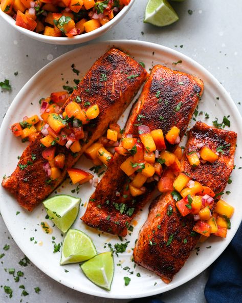 Salmon fillets are rubbed with a smoky chipotle seasoning, baked to perfection and topped with the best homemade peach salsa! They're so easy to make and the perfect blend of sweet and spicy! Chipotle Salmon, Oven Baked Salmon Recipes, Chipotle Seasoning, Oven Baked Salmon, Salsa Ingredients, Peach Salsa, Shrimp Ceviche, Cilantro Lime Dressing, Baked Salmon Recipes