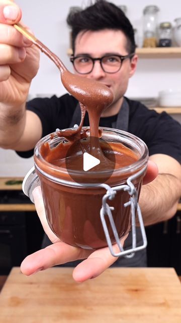 26K views · 2.3K likes | Nico Pallotta on Instagram: "Homemade Hazelnut Spread 🌰

Making hazelnut spread at home is easy! Nutty hazelnuts blend beautifully into a creamy and flavorful nut butter enriched with cacao powder, sugar, and vanilla extract.

You’ll love how simple this homemade Nutella recipe is. It keeps well for weeks and you can have it ready in the fridge for a quick breakfast or snack on a slice of bread.

⭐️ FULL RECIPE: theplantbasedschool.com

INGREDIENTS:
3 cups (350 grams) hazelnuts
¼ cup (50 grams) sugar or more to taste, up to ½ cup.
½ teaspoon olive oil
3 tablespoons (20 grams) cacao powder unsweetened
1½ tablespoons (20 grams) vanilla extract
1 pinch salt

Enjoy ❤️ Nico & Louise
#breakfastrecipes #hazelnut #sweetbreakfast" How To Make Hazelnut Syrup, Homemade Hazelnut Butter, Diy Hazelnut Spread, Healthy Hazelnut Spread, Hazelnut Extract, Homemade Nutella Recipes, Nutella Recipe, Powder Sugar, Homemade Nutella