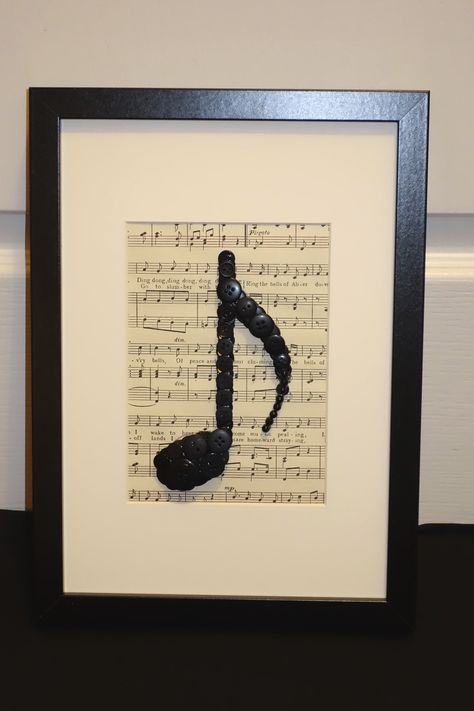 Musical note set on vintage music sheet. Crafts Using Old Sheet Music, Framed Sheet Music, Sheet Music Decor, Piano Crafts, Button Pictures, Vintage Music Sheet, Cafe Concert, Musical Gifts, Craft Hacks