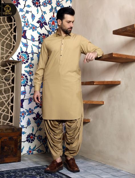 Being the national apparel of Pakistan & India, men's shalwar kameez is a must-have item in every desi man's wardrobe. Getting this amazing wardrobe essential from Royal Club Clothing will get your money's worth as we not only make gents shalwar kameez to direct everyone's attention towards you, our fabric is meticulously engineered to ensure your comfort. Salwar Kameez Men Design, Men’s Shalwar Kameez, Pakistani Mans Kurta Shalwar Kameez, Mens Shalwar Kameez Design Style 2024, Boys Shalwar Kameez Design, Mens Shalwar Kameez Design Style, Gents Shalwar Kameez Design, Men Shalwar Kameez Design, Pakistani Dress Design Salwar Kameez