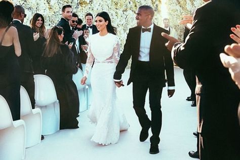 Kim Kardashian and Kanye West For her big (huge!) wedding day with rapper Kanye West, Kim Kardashian wore a Givenchy haute couture gown and ivory satin heels created for the bride by designer Giuseppe Zanotti. Kim Kardashian Wedding Dress, Kimye Wedding, Givenchy Wedding Dress, Kanye West Wedding, Kim Kardashian Wedding, Kardashian Wedding, Estilo Kim Kardashian, Kanye West And Kim, Kim Kardashian Kanye West