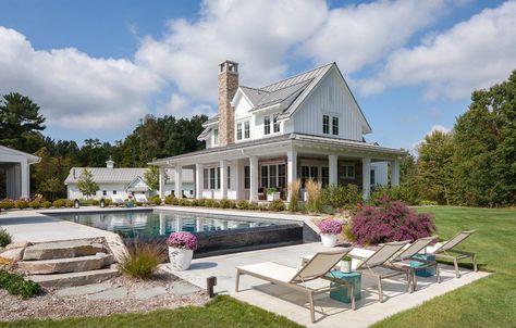 Sears Architects along with Scott Christopher Homes created this gorgeous farmhouse estate nestled in the countryside of Rockford, Michigan. #house #pool #outdoors #country #farmhouse Farmhouse Swimming Pool, Farmhouse Pool Ideas, Farmhouse Style Exterior, Contemporary Farmhouse, Farmhouse Exterior, Swimming Pool Designs, Pool Landscaping, Farmhouse Design, Pool Area