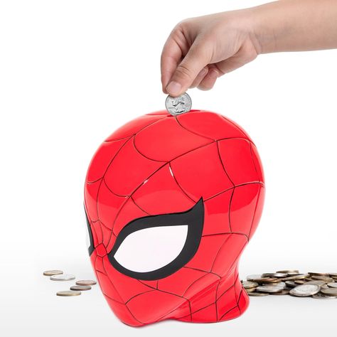 PRICES MAY VARY. ENJOY SAVING – Make saving money easy for your little one with this Marvel Spiderman ceramic piggy bank. Kids will love saving money and collecting coins with the help of their favorite Avenger, Spiderman. HIGH QUALITY – This ceramic piggy bank is easy to use and is sure to get your little one excited to save. Empty bank weighs 1.65 pounds and measures about 8 inches. It includes a rubber stopper on the bottom that can be removed easily if needed. GREAT GIFT –  This is a perfect Spiderman High Quality, Saving Piggy Bank, Spiderman Christmas, Kids Saving Money, Collecting Coins, Spiderman Room, Spiderman Gifts, Toy Money, Saving Habits