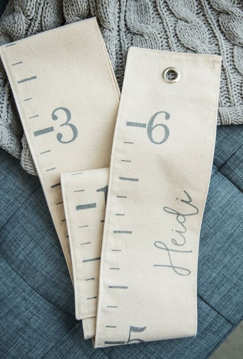 "Portable measuring chart for kids in soft, yet sturdy, canvas. Folds up easily for gifting and moving. Unique baby heirloom piece that grows with your children over the years. White Loft growth charts are a baby registry must-have! * Mark heights with 10 paper key tags + pear-shaped safety pins included.  Simply write on the tags and pin the height. * Made of 100% cream colored cotton canvas, with gray/silver hand-lettered ink and a silver grommet for hanging. *No vinyl is used for numbers or n Fabric Growth Chart, Toddler Bedroom Decor, Ruler Growth Chart, Canvas Growth Chart, Height Ruler, Growth Ruler, Baby Heirloom, Personalized Growth Chart, Growth Chart Ruler