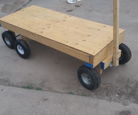 Homemade heavy-duty wagon..Adapt the steering mechanism for pulling by dog.. Diy Cart With Wheels, Yard Wagon, Diy Cart, Wheel Garden, Heavy Duty Wagon, Yard Cart, Build A Garden, Metal Cart, Wooden Cart