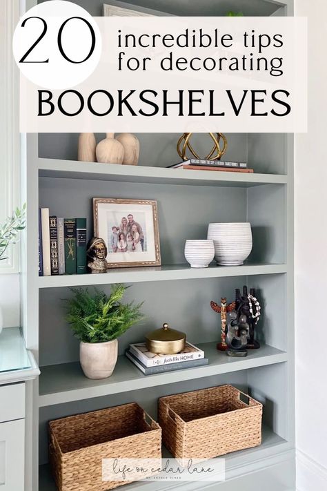 Unlock the secrets of Styling a Bookcase with our blog post on Creative Bookshelf Styling Ideas. Discover expert tips on How To Style Open Bookshelves for a visually appealing and organized display. Transform your space with Creative Bookshelves that showcase your personality and taste. Get inspired to revamp your bookcase like a pro. Library Shelf Decorating Ideas, Built In Decor Ideas, Living Room Shelf Design Ideas, Styling Book Shelves Built Ins, Bookshelves With Picture Frames, Ikea Bookcase Styling, Fireplace Bookshelf Decorating Ideas, Trendy Bookshelf Decor, Book Shelf Fireplace Decor