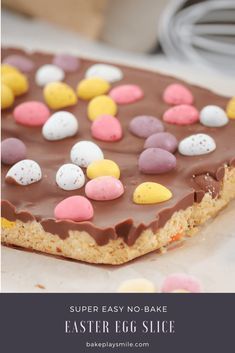 The easiest No-Bake Easter Egg Slice you'll ever make! A biscuit base filled with your favourite mini Easter eggs, topped with a chocolate layer and even more Easter eggs! Easter Kids Food, Easy Easter Recipes, Easter Cooking, Easter Food Appetizers, Easy Easter Desserts, Mini Chef, Kid Desserts, Easter Baking, Easter Desserts