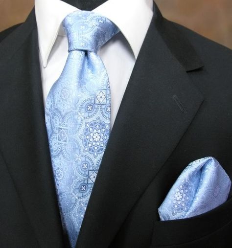 Black suit with baby blue tie-- paisley tie from the tie bar Black Suit Light Blue Tie Wedding, Black Suit Light Blue Shirt Men, Black Suit Blue Tie Wedding, Black Tux With Light Blue Tie, Groomsmen Black Suit Blue Tie, Black Suit With Blue Accents, Black Suit Colored Tie, Blue Tie With Black Suit, Black Suit Light Blue Tie