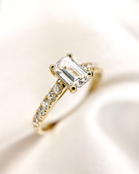 Ring Nora Royal holds a perfectly cut emerald diamond. Did you know this diamond shape is loved because of its famous hall-of-mirrors effect?⁠ 💎⁠ The hall-of-mirrors effect in an emerald cut diamond refers to the way its long, rectangular facets reflect light back and forth within the stone, creating a mesmerizing series of reflections that resemble a hall of mirrors, enhancing the diamond’s depth and brilliance.⁠ 💎⁠ People love emerald cut diamonds for their elegant, timeless look. When sele... Hall Of Mirrors, Solitaire Earrings, Emerald Cut Diamond, Solitaire Necklaces, Pave Ring, Proposal Ring, Three Stone Rings, Emerald Cut Diamonds, Emerald Diamond