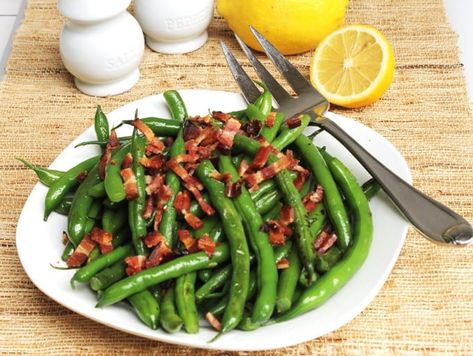 A side dish recipe for green beans with bacon crumbles that has a little zip of red pepper flakes. The green beans are crisp and tender and a bright green. Beans With Bacon, String Beans, Green Beans With Bacon, Sauteed Green Beans, String Bean, Crumble Recipe, Fresh Green Beans, Green Bean Recipes, Veggie Sides