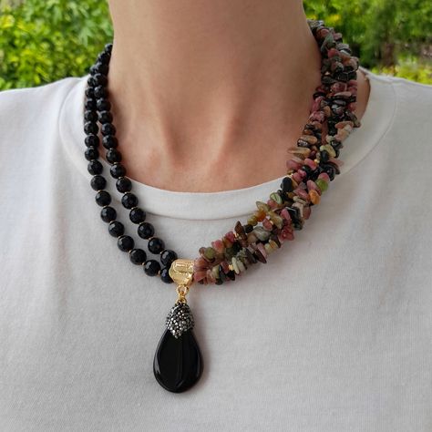 Rainbow tourmaline raw crystal and onyx layered necklace. Chunky statement gemstone beaded necklace for women. Large rainbow and black handmade necklace with big bead and gemstone. Big bold bohemian bright necklace in gold color are suitable for an casual look, evening look and for a holiday. These necklace will be a good christmas, anniversary, wedding or birthday gift for wife, girlfriend, sister or daughter. Women's necklace with natural stone. It emphasizes the beauty of your neck and adds c Diy Chunky Necklace, Statement Bead Necklace, Chunky Crystal Necklace, Big Bead Necklace, Black Stone Necklace, Bold Bohemian, Rainbow Tourmaline, Raw Crystal Pendant, Bright Necklace