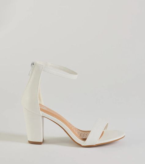 A pair of faux leather heels featuring a sleek almond toe, block heel, and a closed ankle with a zipper closure to secure the style. Perfect for everyday wear.