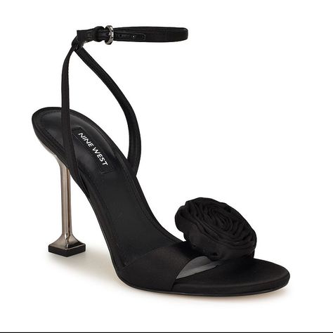 Elevate your style with these Nine West Neve Women's Dress Sandals.Click this FOOTWEAR GUIDE to find the perfect fit and more! Elevate your style with these Nine West Neve Women's Dress Sandals. Click this FOOTWEAR GUIDE to find the perfect fit and more! FEATURES Rose detail upper Tapered heel Ankle buckle closure for a secure fitDETAILS Satin upper Manmade lining and outsole Open toe Buckle closure 3.54-in. heel Spot clean Imported Size: 9.5. Color: Black Satin. Gender: female. Age Group: adult Black Summer Heels, Shoes Heels Classy, Heels Classy, Shoe Inspo, Slingback Sandal, Dress Sandals, Ankle Strap Sandals, Casual Boots, Shop Sandals