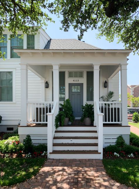 A two bedroom home with a twist: either facade can be front-facing. Compact dimensions make it an excellent choice for cottage courts, accessory dwelling units, and shallow lots. 1 bedrooms - 1.5 baths 40' W x 33' D 1.5 stories 804 square feet Delivery window: one week. Small Farmhouse Porch, Raised Beach House, Small Front Porches Designs, Exterior Design Backyard, Tiny House Village, Liberty House, 1920s House, House Trim, Front Porch Design